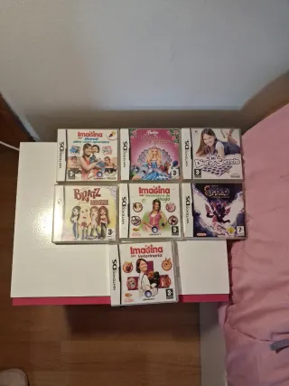 Nintendo DS Rosa con Correa y juegos