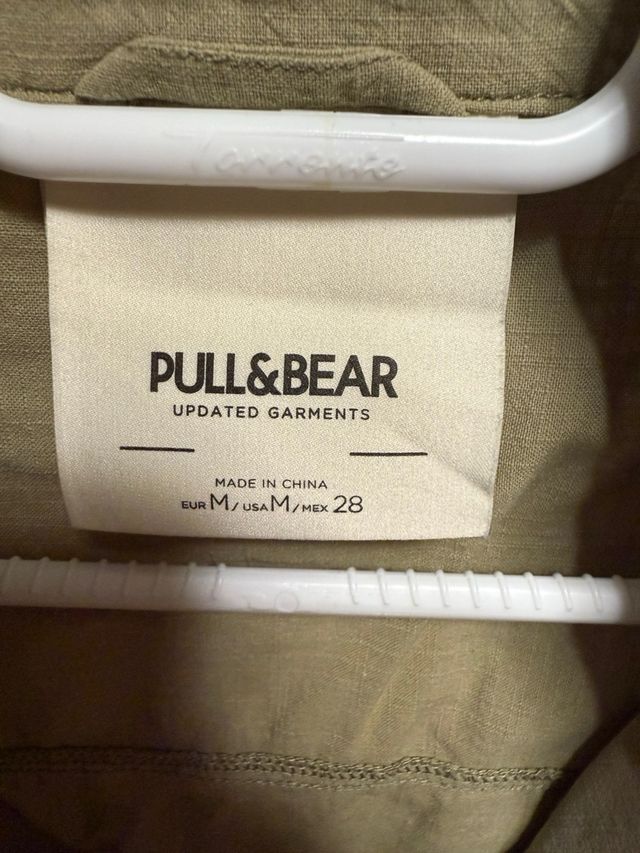 chaleco verde pull and bear