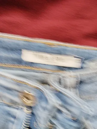 Conjunto jersey y vaqueros