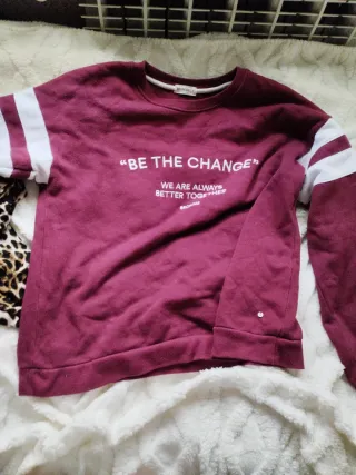 Conjunto jersey y vaqueros