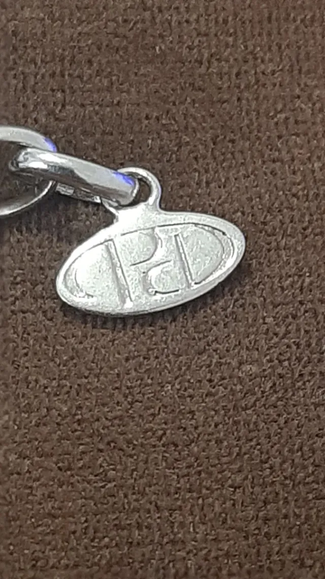 Pulsera de plata con charm azul