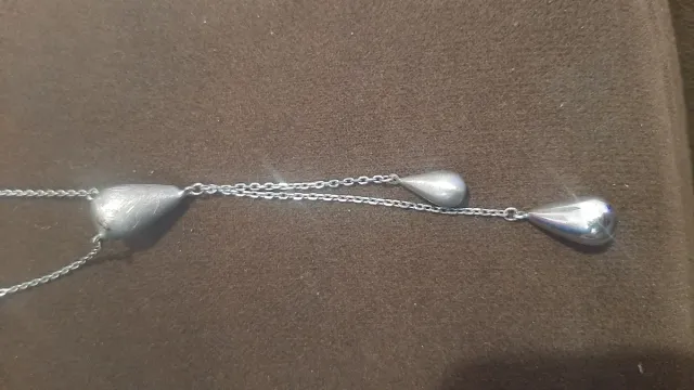 Collar de plata con colgantes