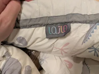 Cojin nido bebé reductor dinosaurios.