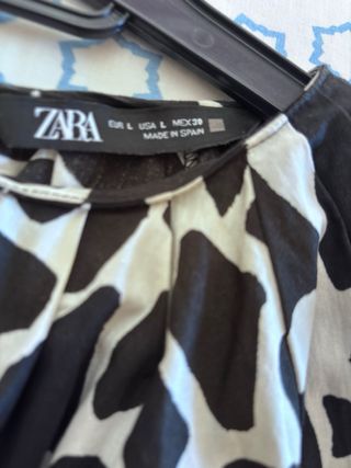 Blusa Zara Estampado Animal Manga tres cuartos.