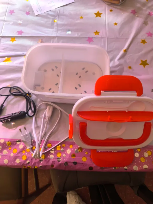 Fiambrera eléctrica naranja y blanca