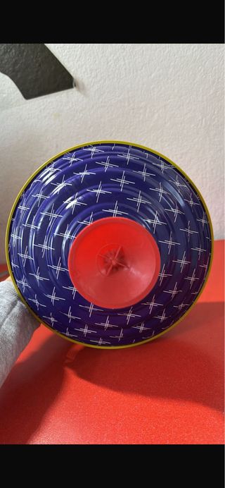 Trottola colorata in metallo