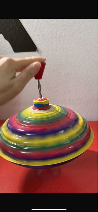 Trottola colorata in metallo