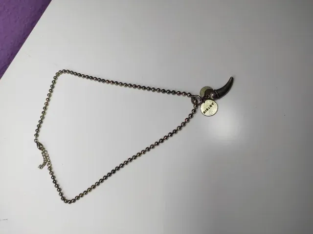 Colgante cuerno Sisley