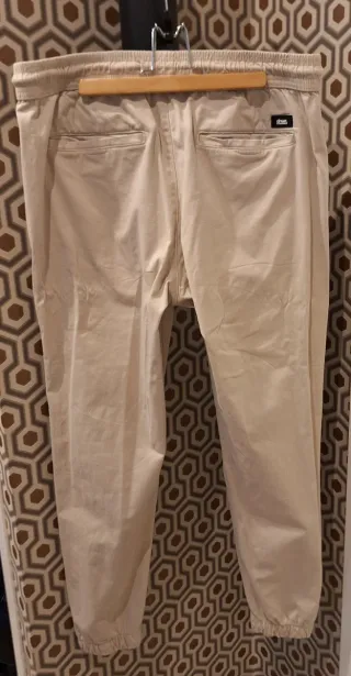 Pantalones chico beige