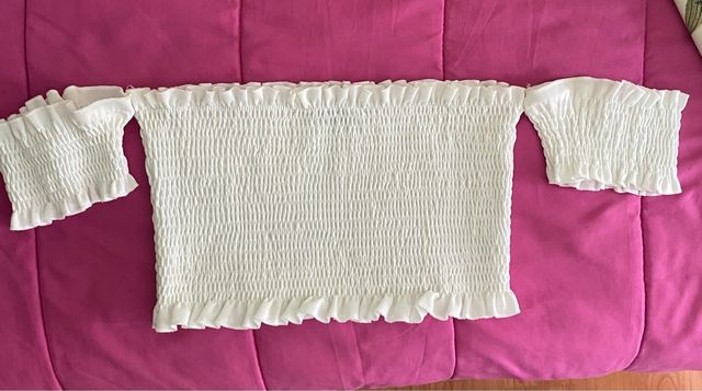 Top blanco elástico sin mangas