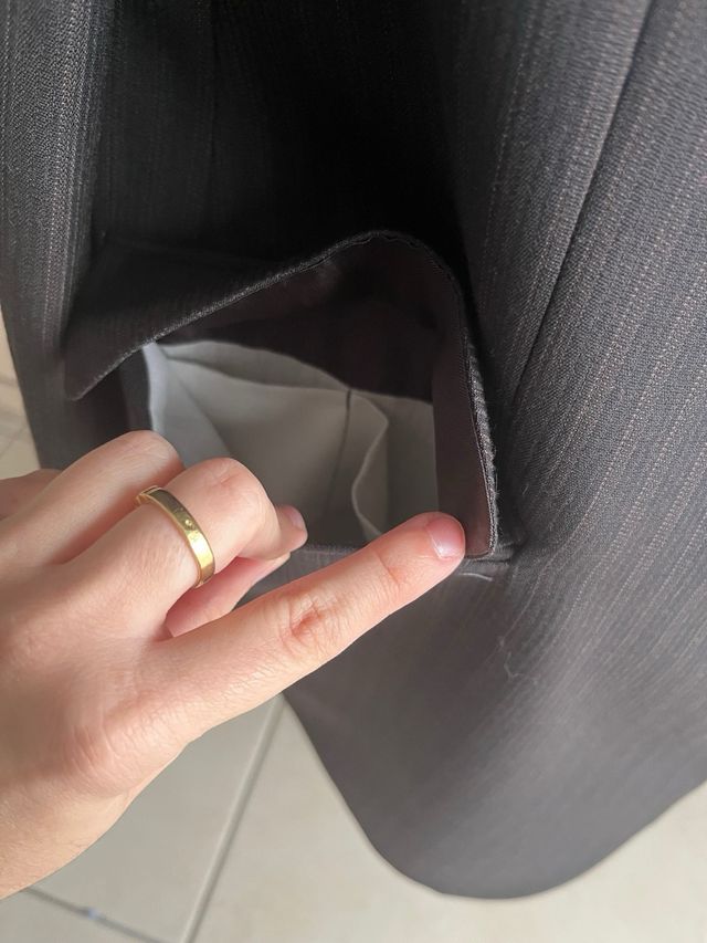 Traje de chaleco y pantalón negro