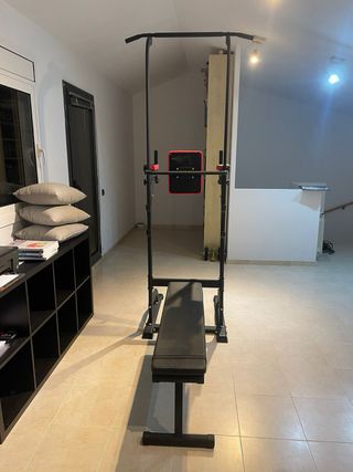 Máquina de dominadas con banco