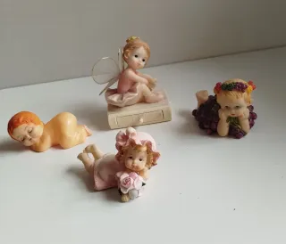 Lotto 4 statuette bambine