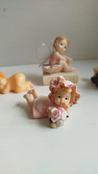 Lotto 4 statuette bambine