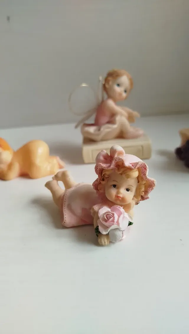 Lotto 4 statuette bambine