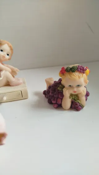 Lotto 4 statuette bambine