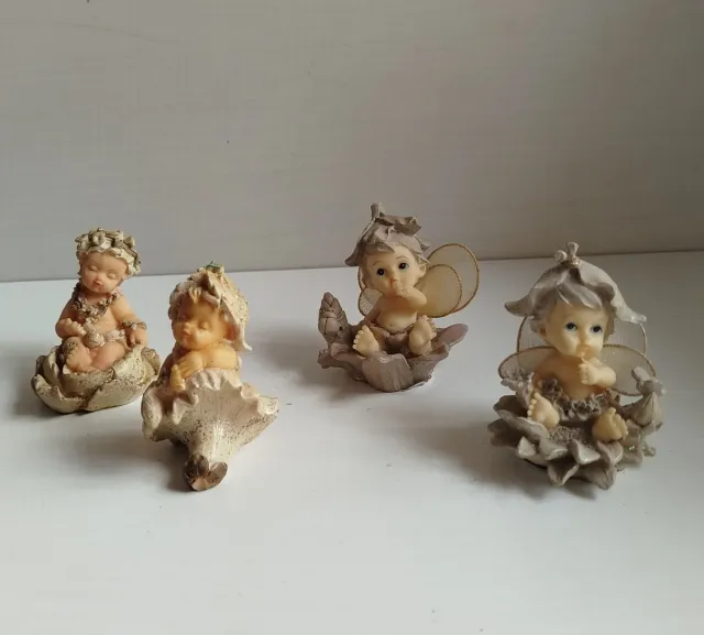 Lotto 4 statuette angioletti