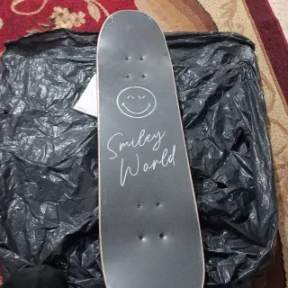 Monopatín Smiley World