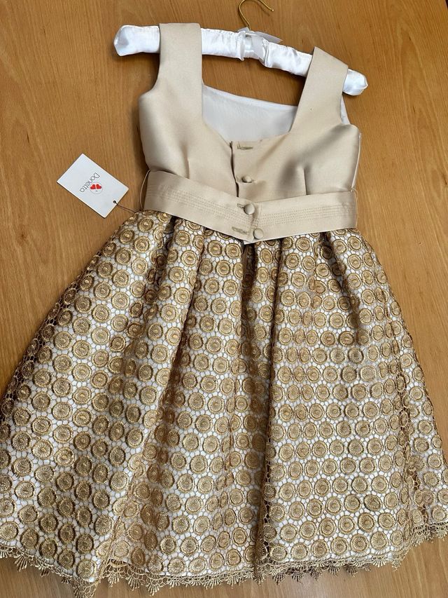 Vestido ceremonia niña dorado