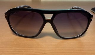 Gafas de sol Gucci negras y moradas