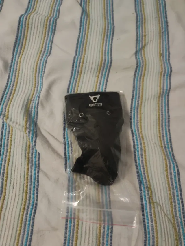 Coquilla protectora Ringhorns nueva sin usar