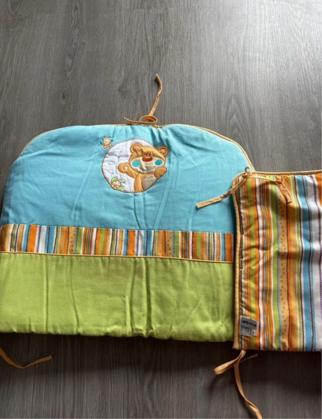 Piumino, cuscino e protettore per culla