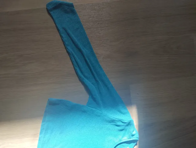 Top corto manga larga