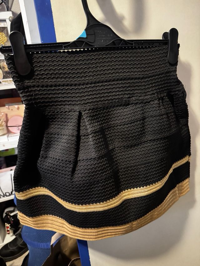 Falda negra con rayas doradas Talla M