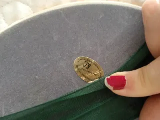 Decorazione ovale con angeli e nastri