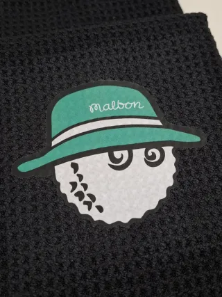 Toalla Golf Malbon con Mosquetón
