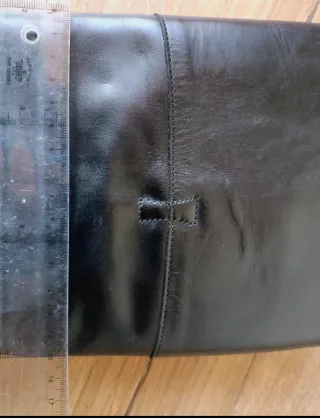 Botas altas de cuero negras con cordones