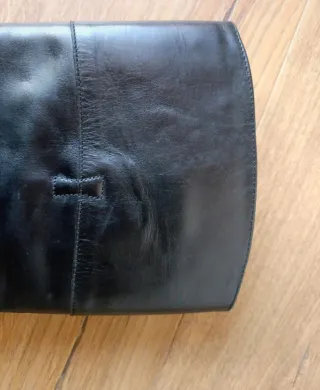 Botas altas de cuero negras con cordones