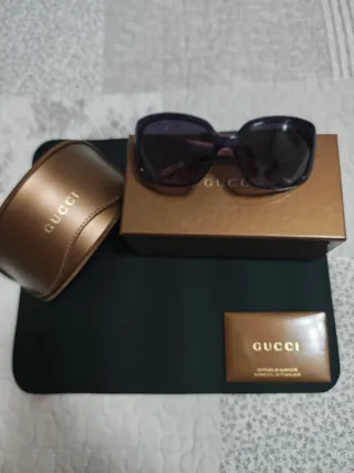 Occhiali da sole donna Gucci viola e marroni