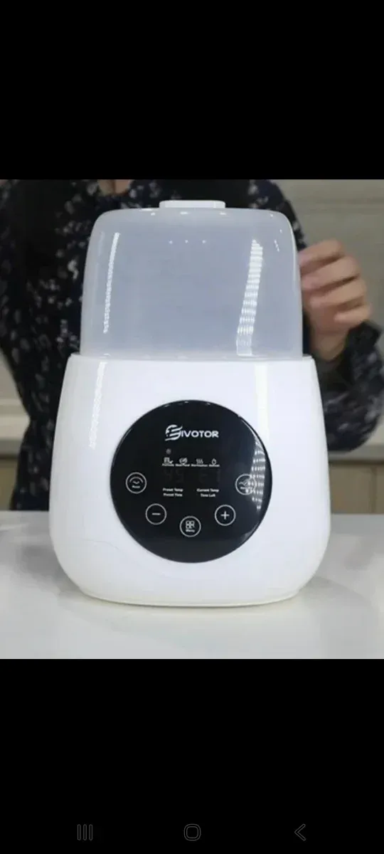 Calienta biberones doble.