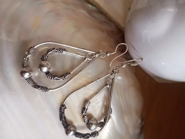 Pendientes plateados diseño artesanal