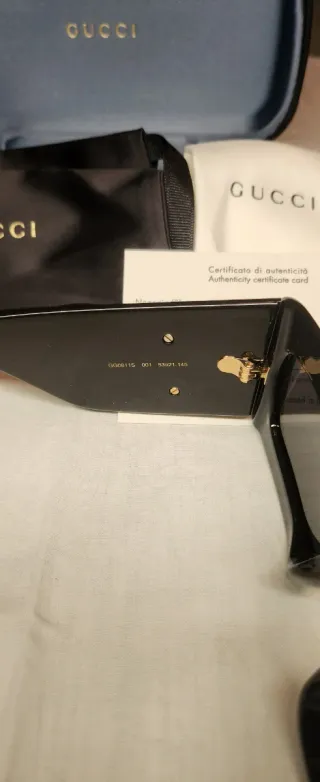 Gafas de sol Gucci negras y marrones