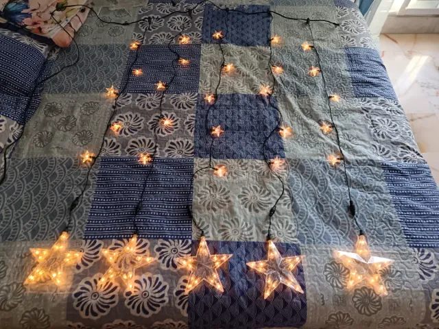 Stupende luci decorative a forma di stella dorate