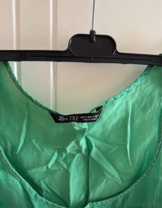 Blusa verde con bolsillo