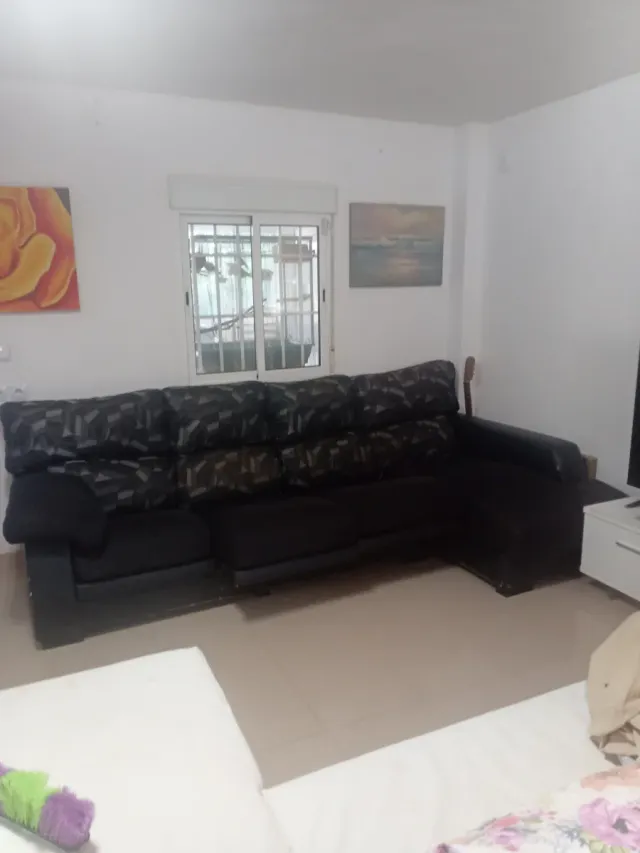 Sofá modular con asiento deslizante Un