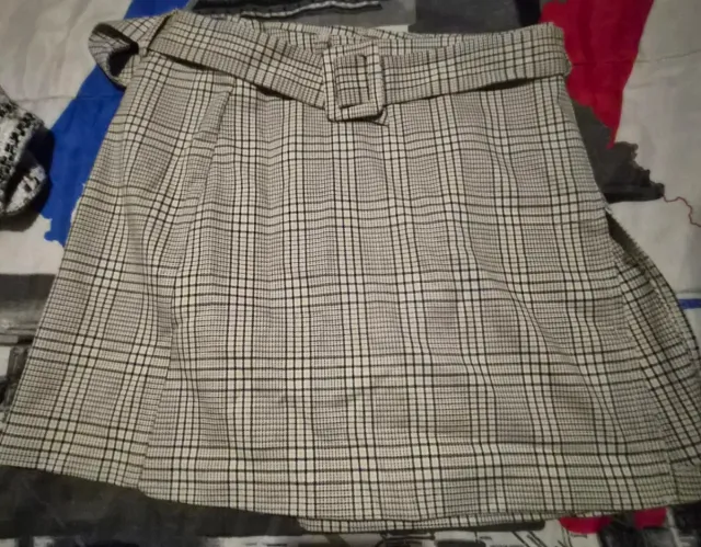 Falda pantalón cuadros beige y negro