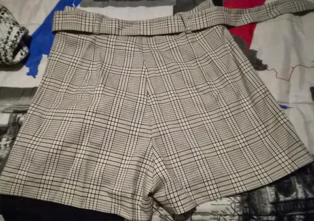 Falda pantalón cuadros beige y negro