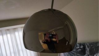 Lampada ad arco con base in marmo