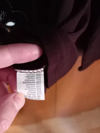 Blusa de mujer marrón con pedrería nueva.