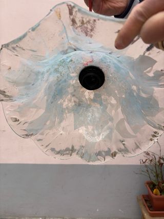 Lampadario in vetro con base rossa