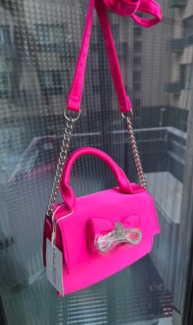 Bolso fucsia lazo