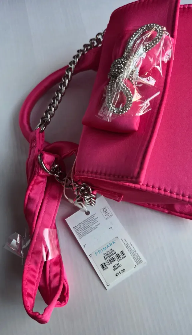Bolso fucsia lazo