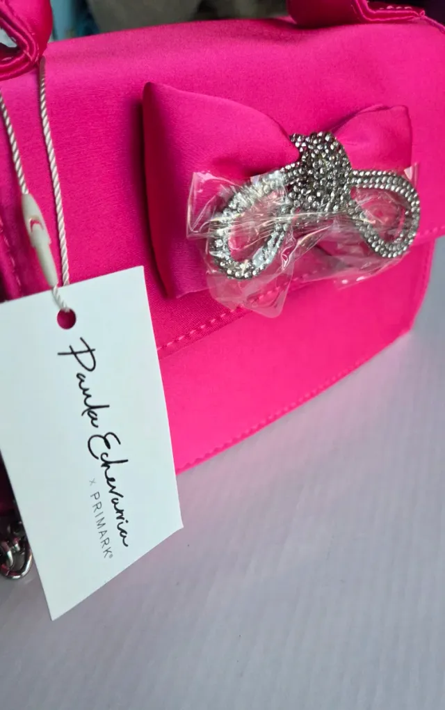 Bolso fucsia lazo