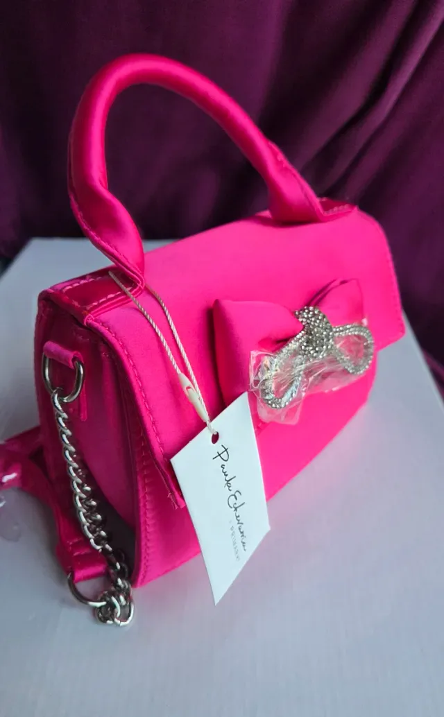 Bolso fucsia lazo
