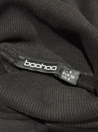 Vestido negro cuello alto con cinturón