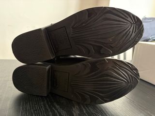 Botas altas de piel negras